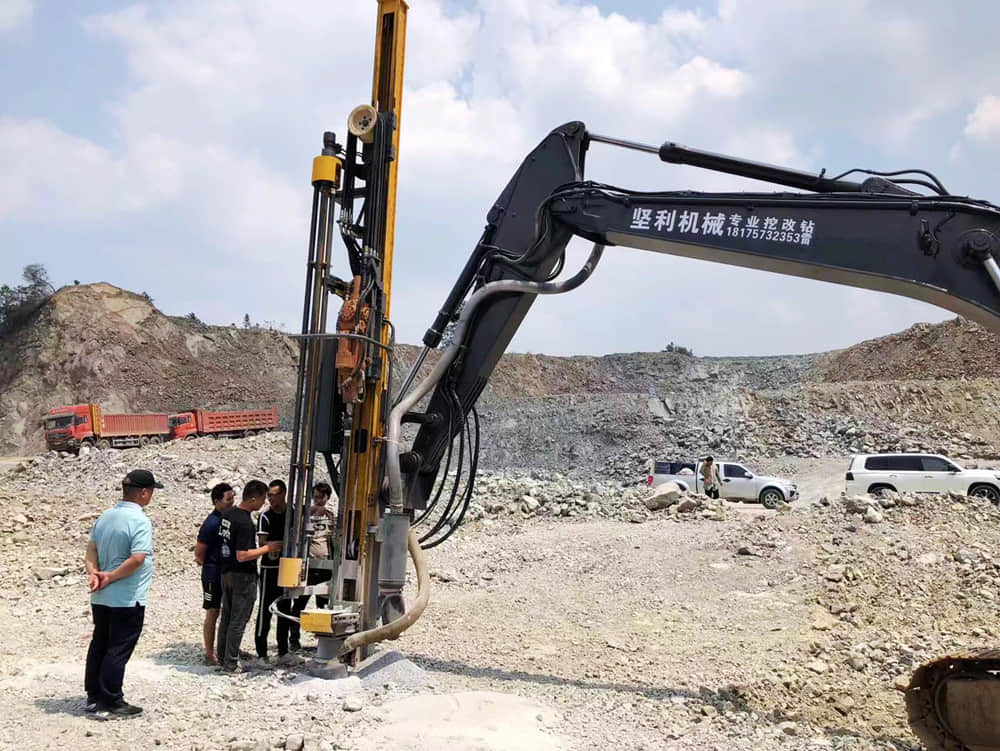 Hydraulic rock drill attachments