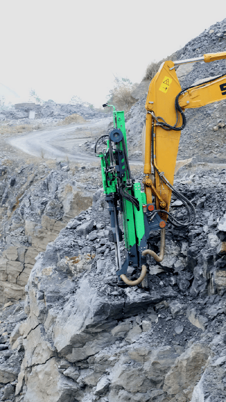 The first hydraulic rock drill and splitter in action